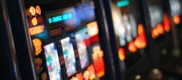 row of slightly burred pokie machines