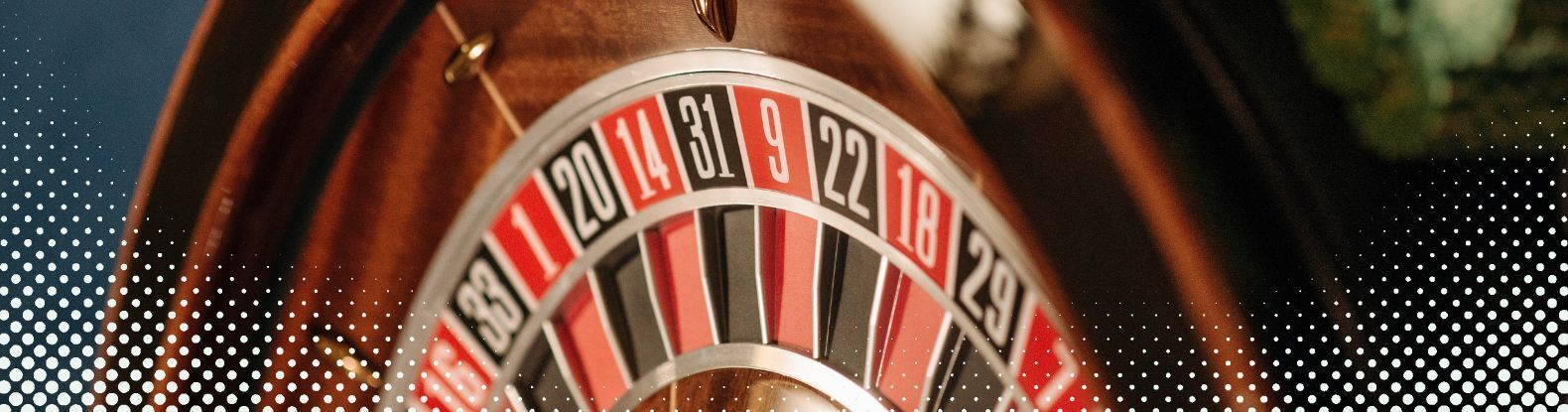 This is a close up pic of a roulette wheel at a casino