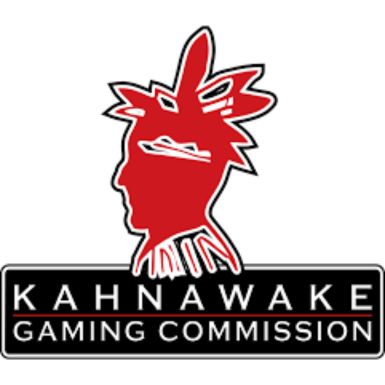 Logo for the Kahnawake Gaming Commission with white text on black and a red silhouette of a native american in a feathered headdress