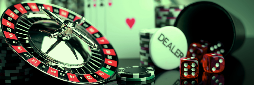 A vibrant casino scene with a spinning wheel, dice, and poker chips arranged on a gaming table.